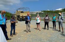 Daryl Jaschen, Director of the Virgin Islands Territorial Emergency Management Agency, (center), meets with members of Region 2's Incident Management Assistance Team, FEMA U.S. Virgin Islands logistics staff and partners from the U.S. Virgin Islands Department of Human Services and Love City Strong during a Community Points of Distribution field exercise in Gifft Hill. 