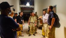 Territorial Airport Manager Jerome Sheridan, of the V.I. Port Authority, (right) leads federal Air Operations and FEMA logistics on a walk-through in May of Cyril E. King Airport during a Readiness Initiative Capstone hurricane response functional exercise.