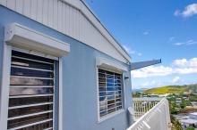 This home in Pine Peace on St. John received roll-down shutters to withstand storm-force winds. 