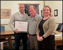 FEMA Region 3 presents plaque to local officials at the Borough of Yardley’s Council Meeting. From left: Bobby Cobelli, FEMA NFIP Specialist; Wes Foraker, Yardley Borough Emergency Management Coordinator; Audrey Kenny, Bucks County Director of Emergency Services