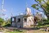 Photo of Hurricane Maria survivor's  house, mid-construction, using stronger building materials that she got thanks to federal assistance for survivors of Hurricane Maria. 