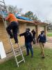 FEMA Incident Management Assistance Team Assists Resident of Baton Rouge With a Roof Tarp after Hurricane Laura